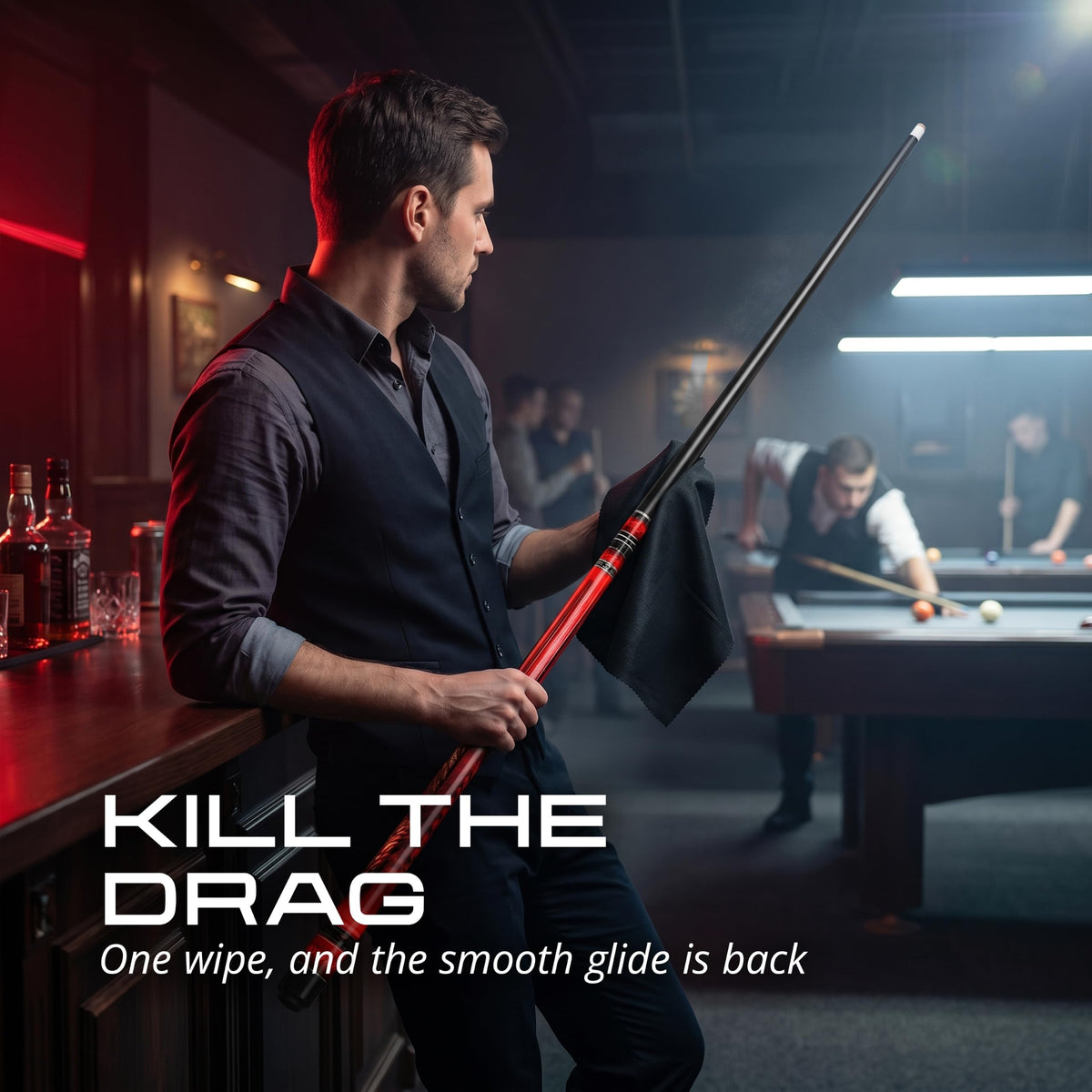 Player wiping the IgnatGames Flamestorm pool cue shaft with a cloth in a pool hall