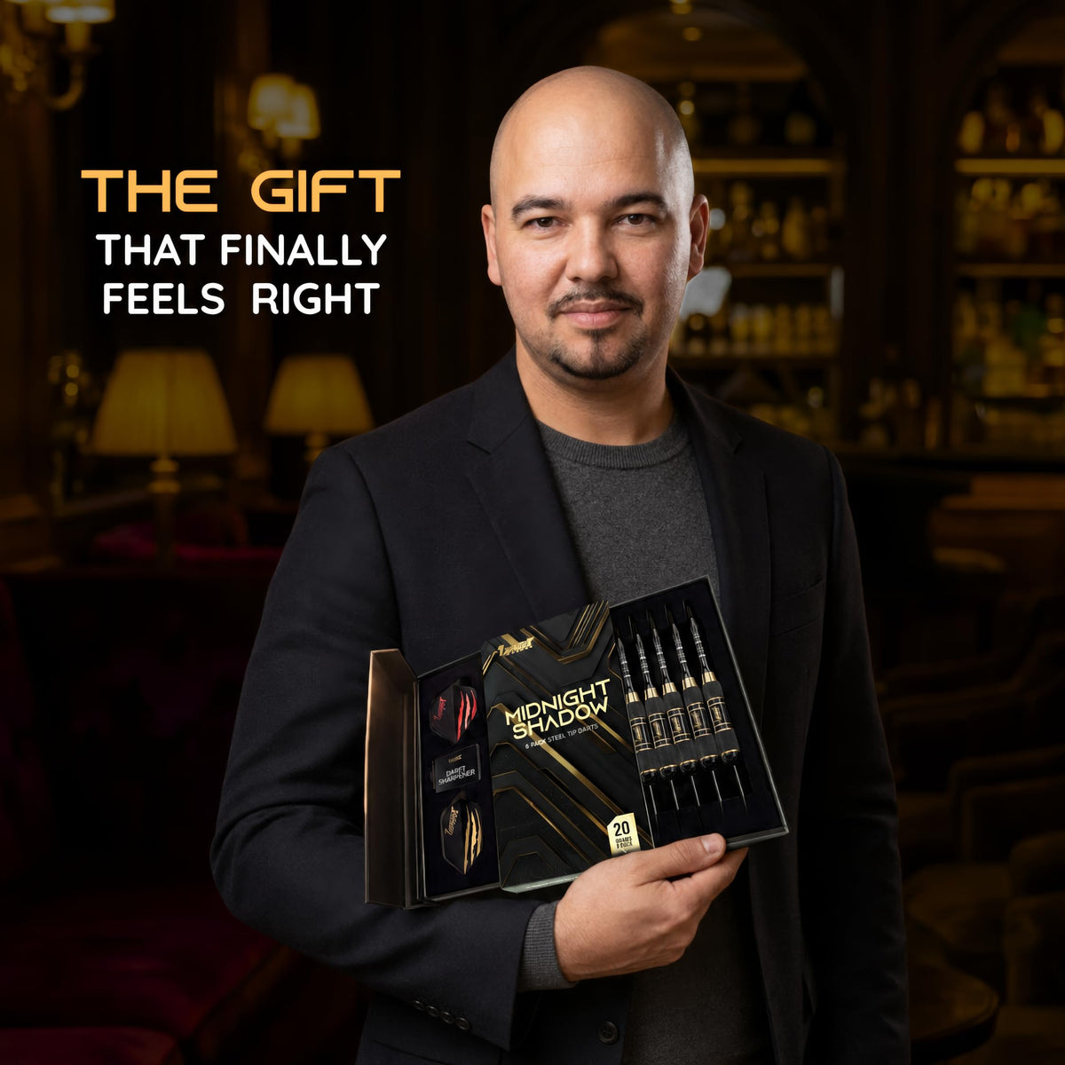 Man presenting the IgnatGames Darkborn Midnight Shadow 20 g darts gift box